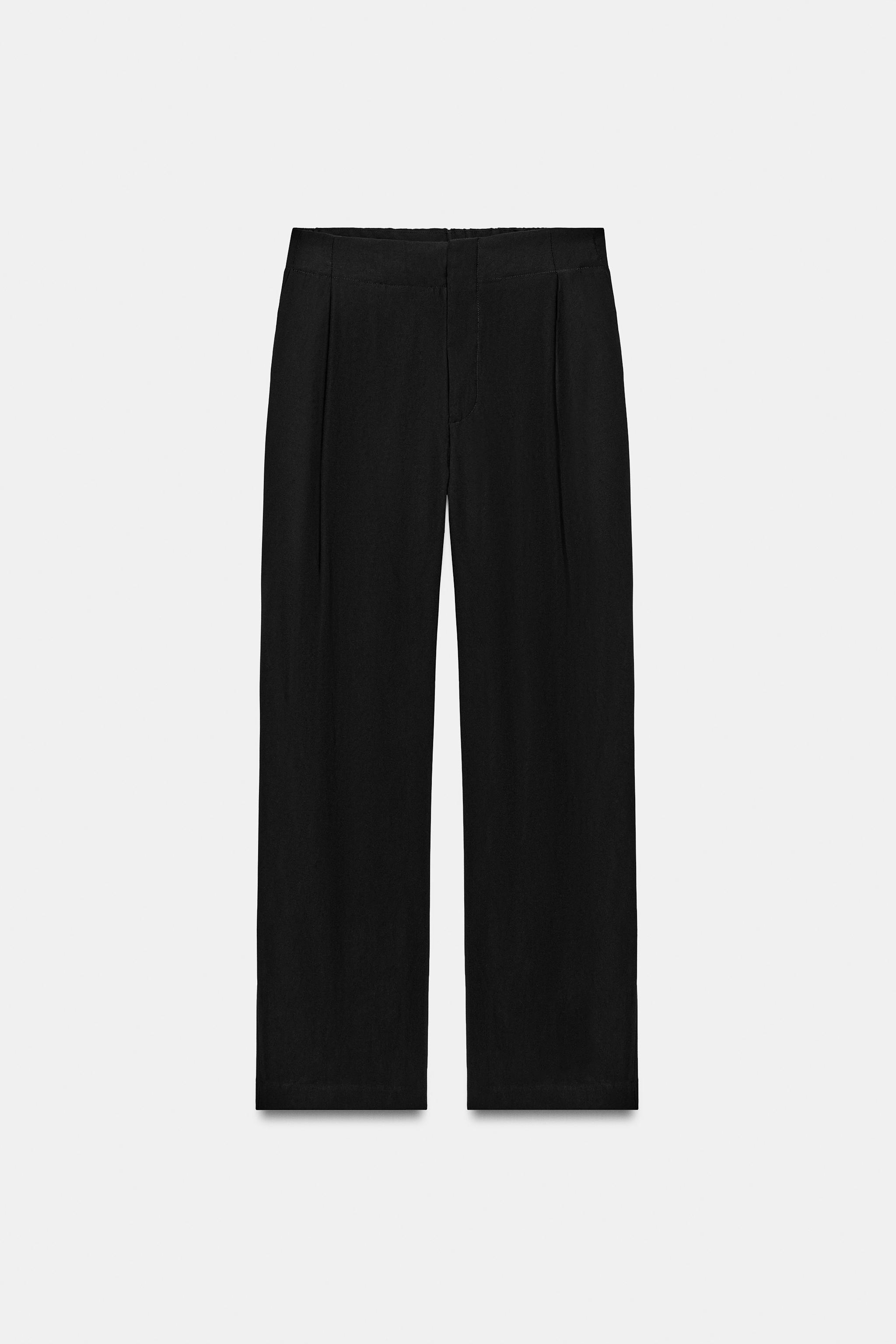 PLEATED FLOWY TROUSERS